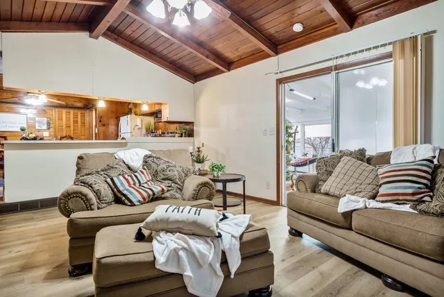 a bedroom with furniture and a fireplace