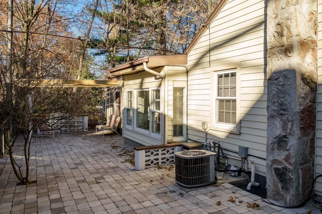a building outdoor space with lots of furniture and windows
