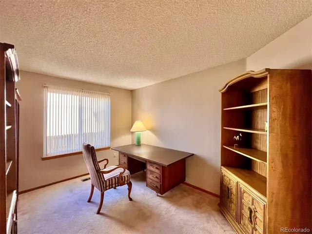 a room with furniture and window