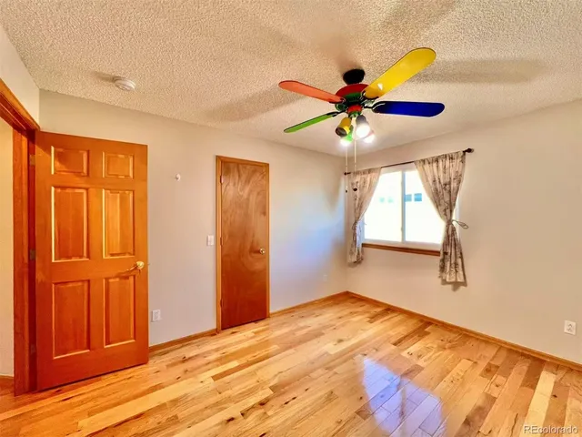 a view of a bedroom with a natural light