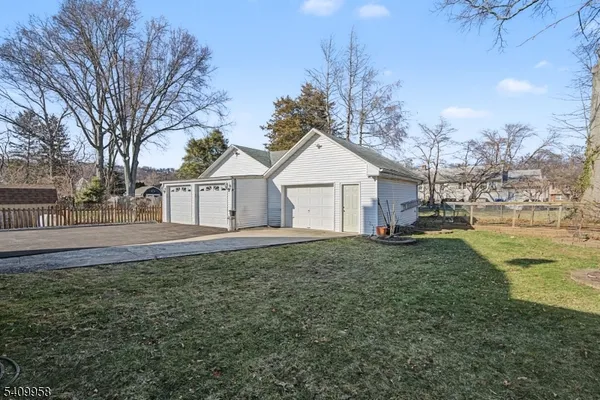 a view of a yard with a house and a yard