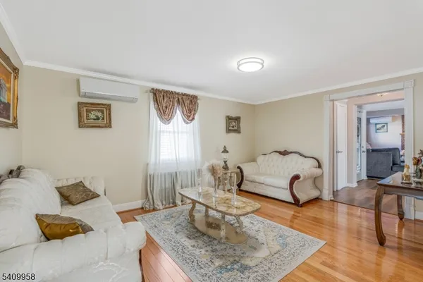 a living room with furniture and a table
