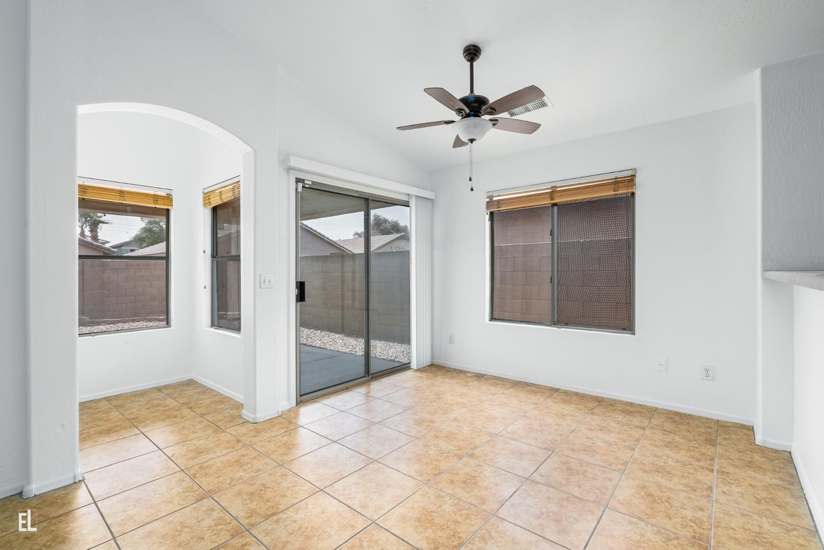 12937 West Bloomfield Road El Mirage, AZ 85335 - Photo 19 of 25 a view of an empty room and window