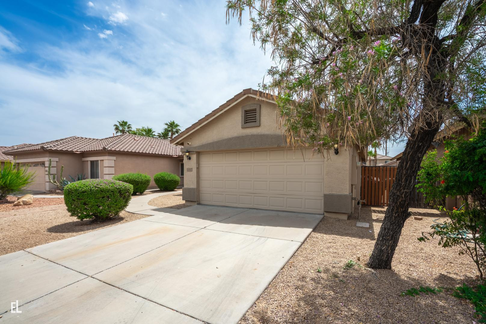 12937 West Bloomfield Road El Mirage, AZ 85335 - Photo 2 of 25 a house view with a outdoor space