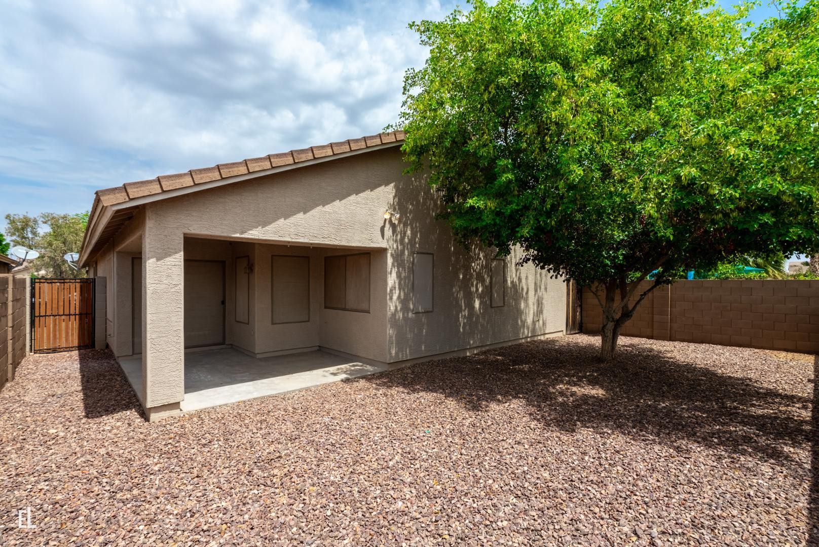 12937 West Bloomfield Road El Mirage, AZ 85335 - Photo 24 of 25 a backyard of a house