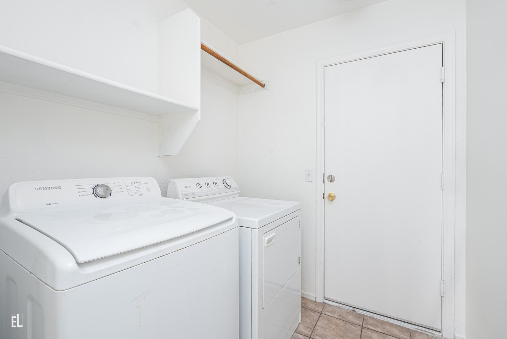 12937 West Bloomfield Road El Mirage, AZ 85335 - Photo 6 of 25 a utility room with dryer and washer