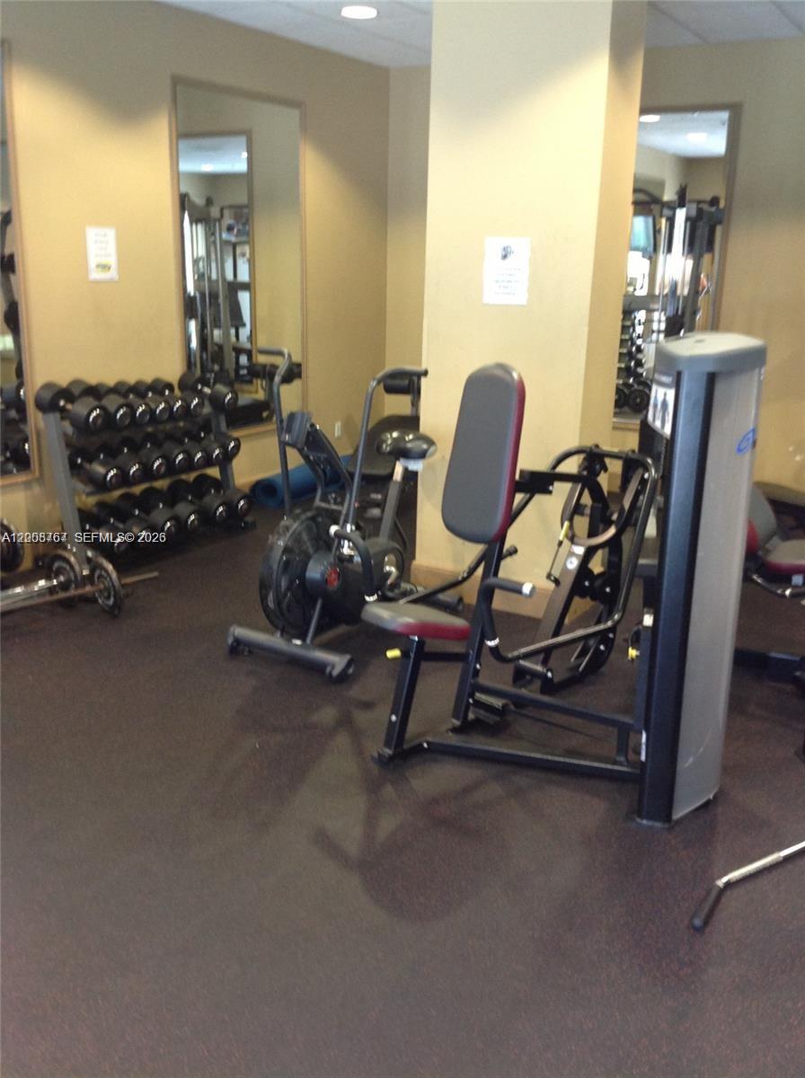 2665 Southwest 37th Avenue, Unit 710 Miami, FL 33133 - Photo 13 of 13 a room with gym equipment