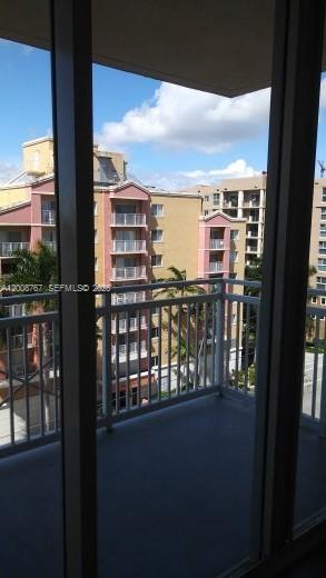 2665 Southwest 37th Avenue, Unit 710 Miami, FL 33133 - Photo 5 of 13 a view of a balcony with an ocean view