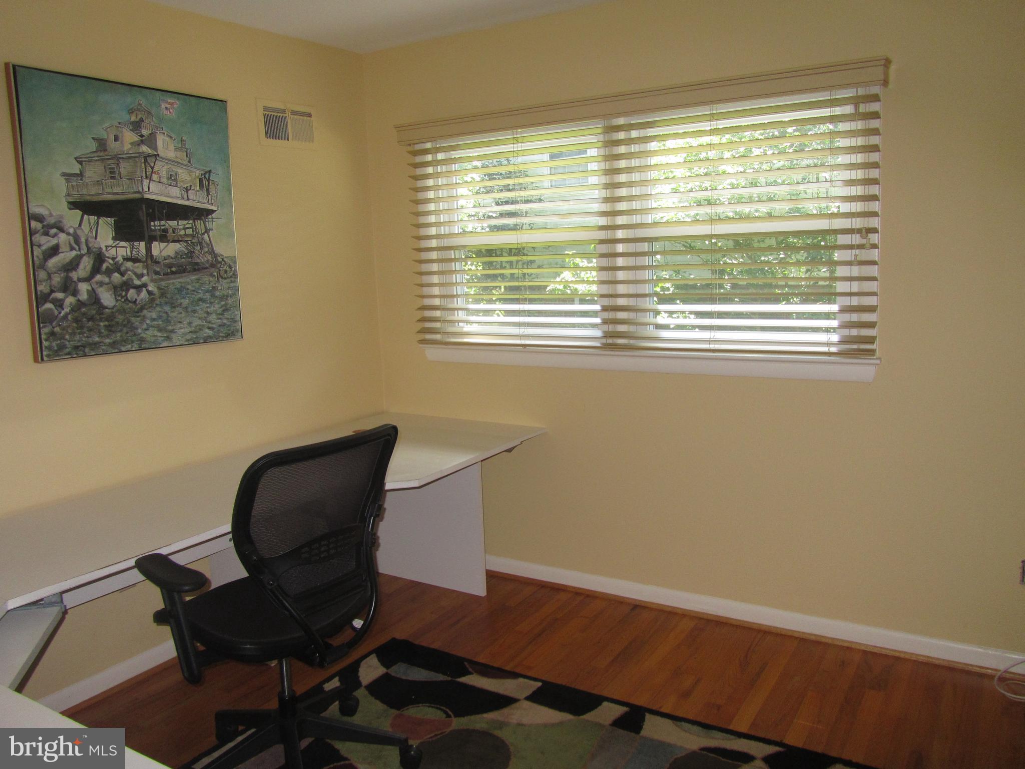 10613 Glenwild Road Silver Spring, MD 20901 - Photo 14 of 26 a workspace with furniture and a window