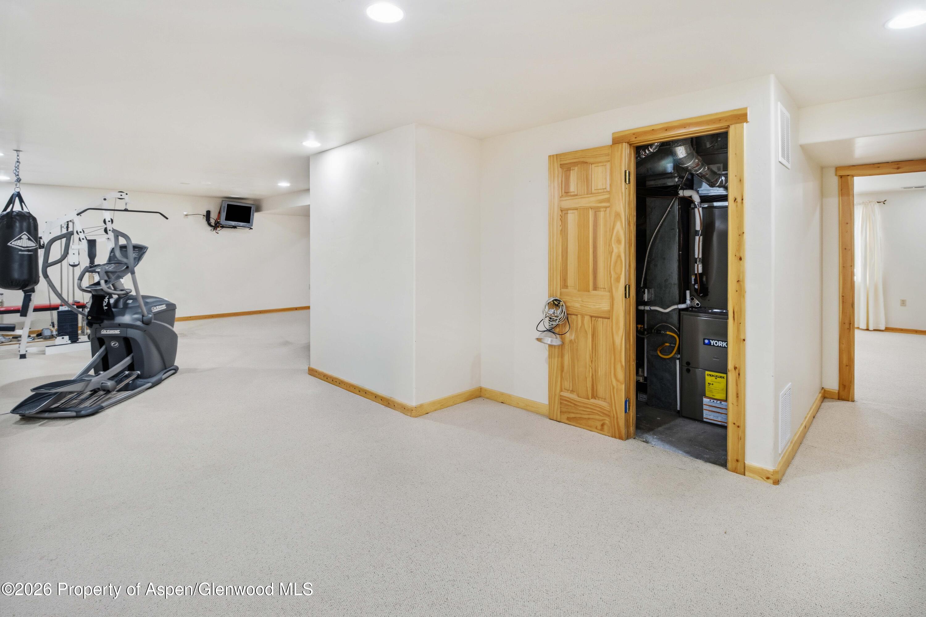 660 Aspen Avenue Rifle, CO 81650 - Photo 24 of 30 a view of a room with gym equipment