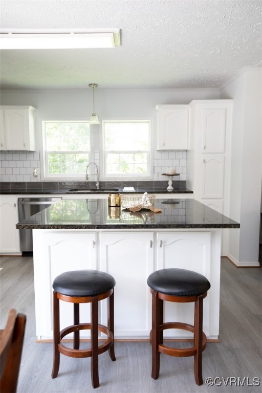 2800 Springfield Road Meherrin, VA 23954 - Photo 20 of 44 a kitchen with stainless steel appliances granite countertop a table chairs sink and cabinets
