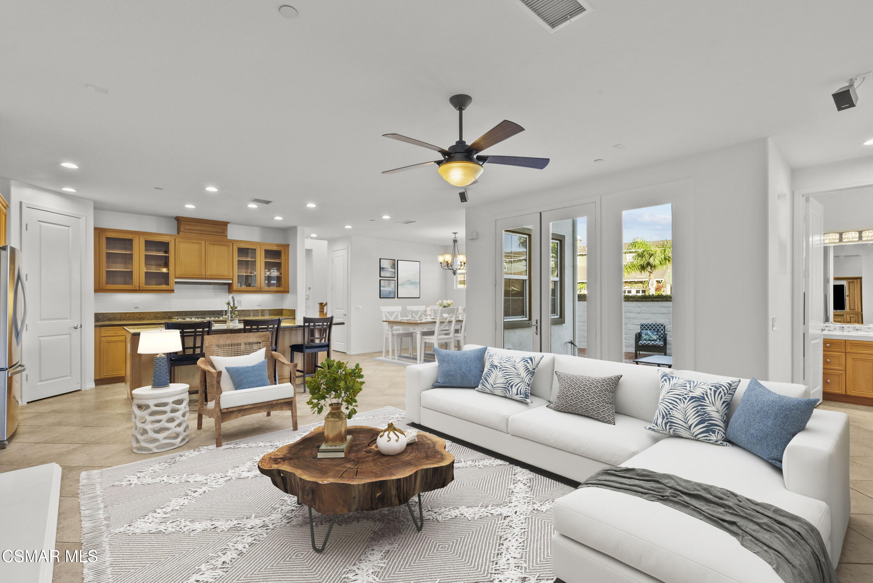 1316 Estuary Way Oxnard, CA 93035 - Photo 11 of 46 a living room with furniture a rug and a chandelier