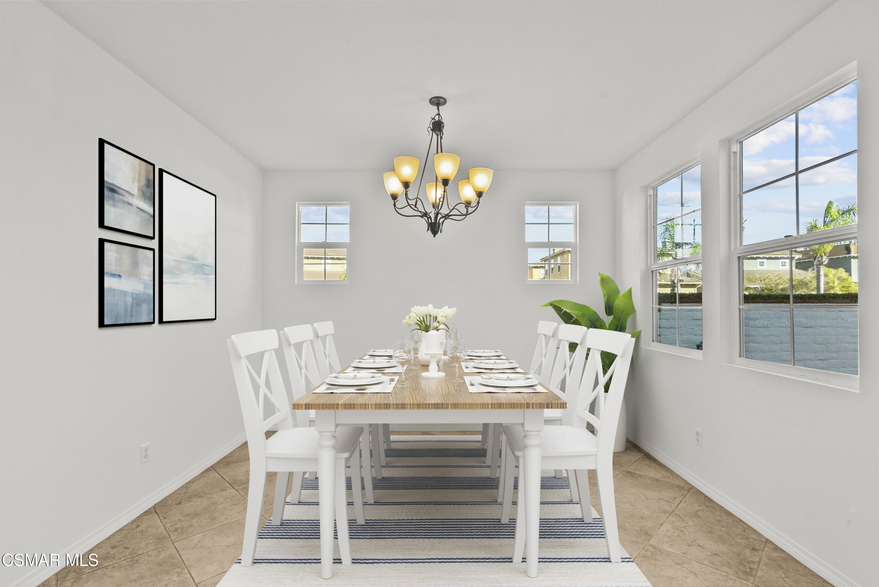1316 Estuary Way Oxnard, CA 93035 - Photo 15 of 46 a dining room with furniture and chandelier