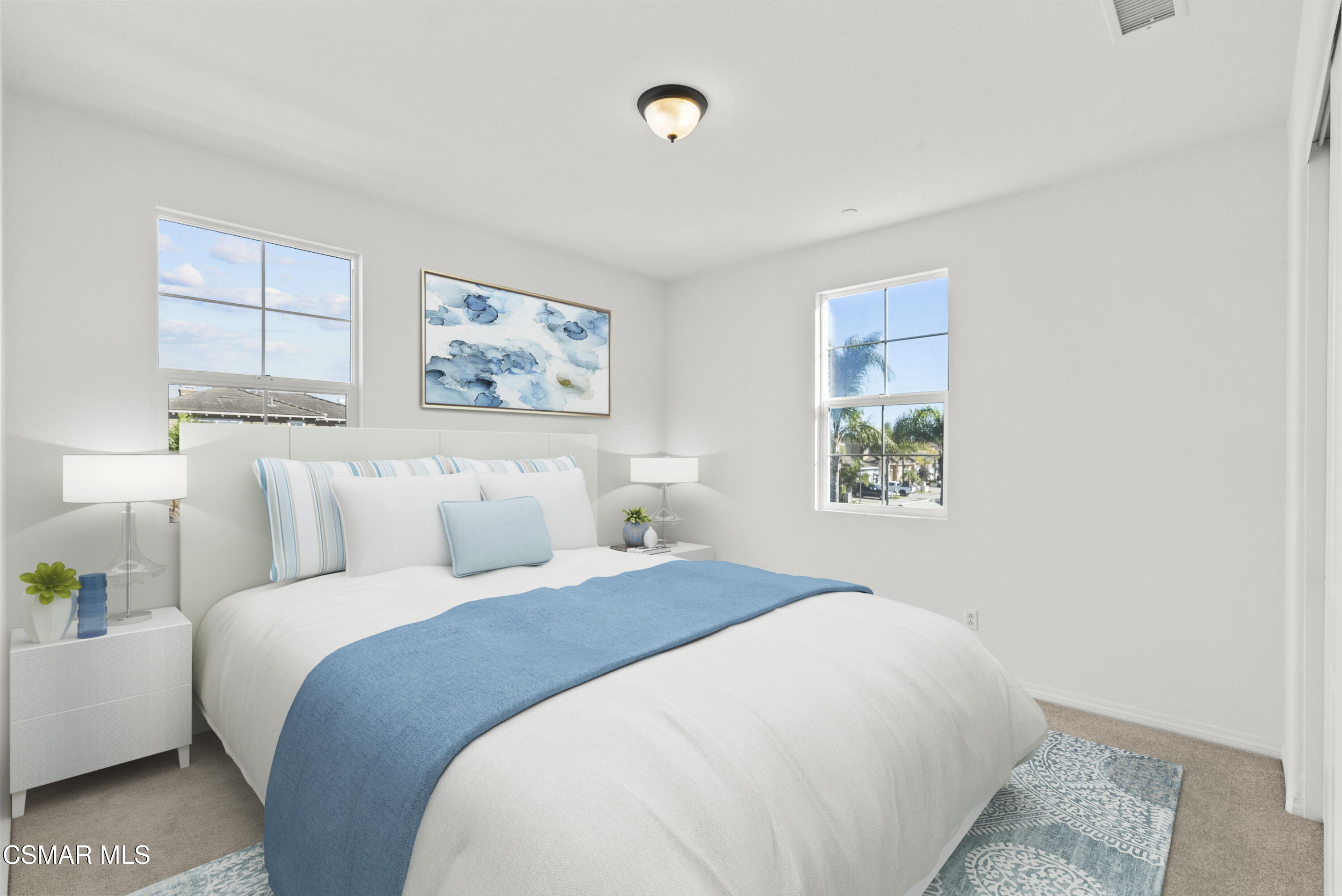 1316 Estuary Way Oxnard, CA 93035 - Photo 19 of 46 a bedroom with a bed and a painting on the wall