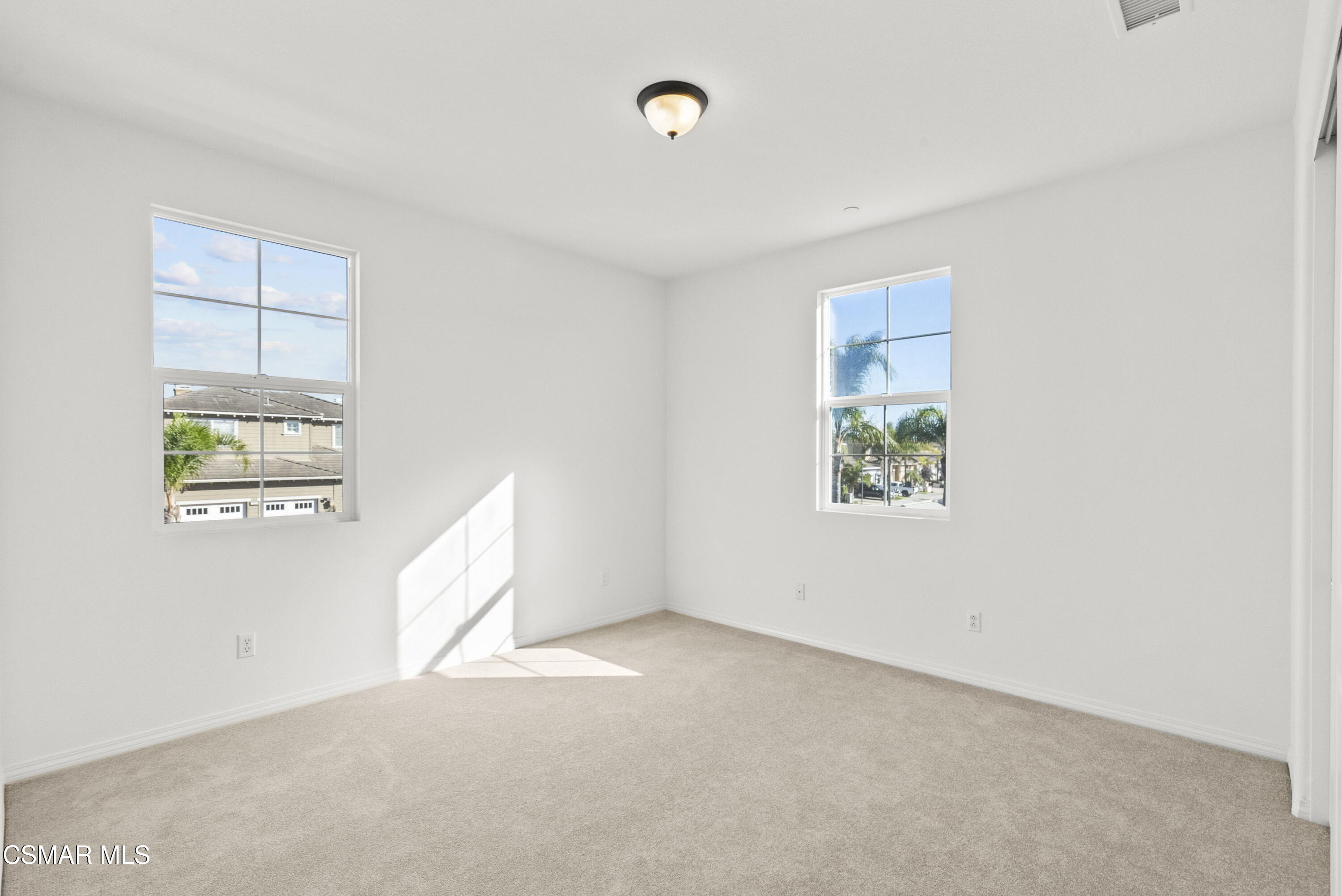1316 Estuary Way Oxnard, CA 93035 - Photo 20 of 46 an empty room with windows