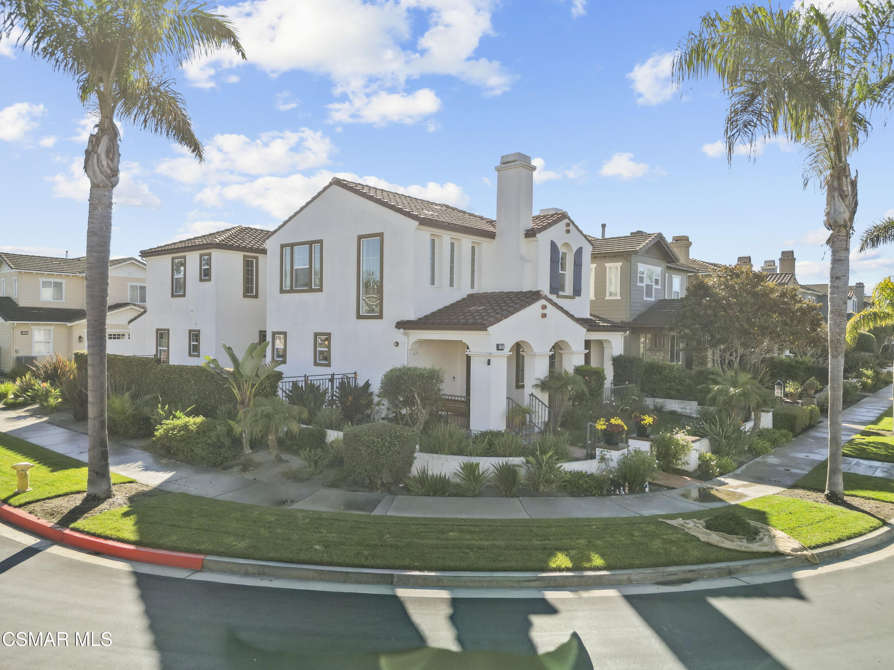 1316 Estuary Way Oxnard, CA 93035 - Photo 2 of 46 a front view of a house with a yard