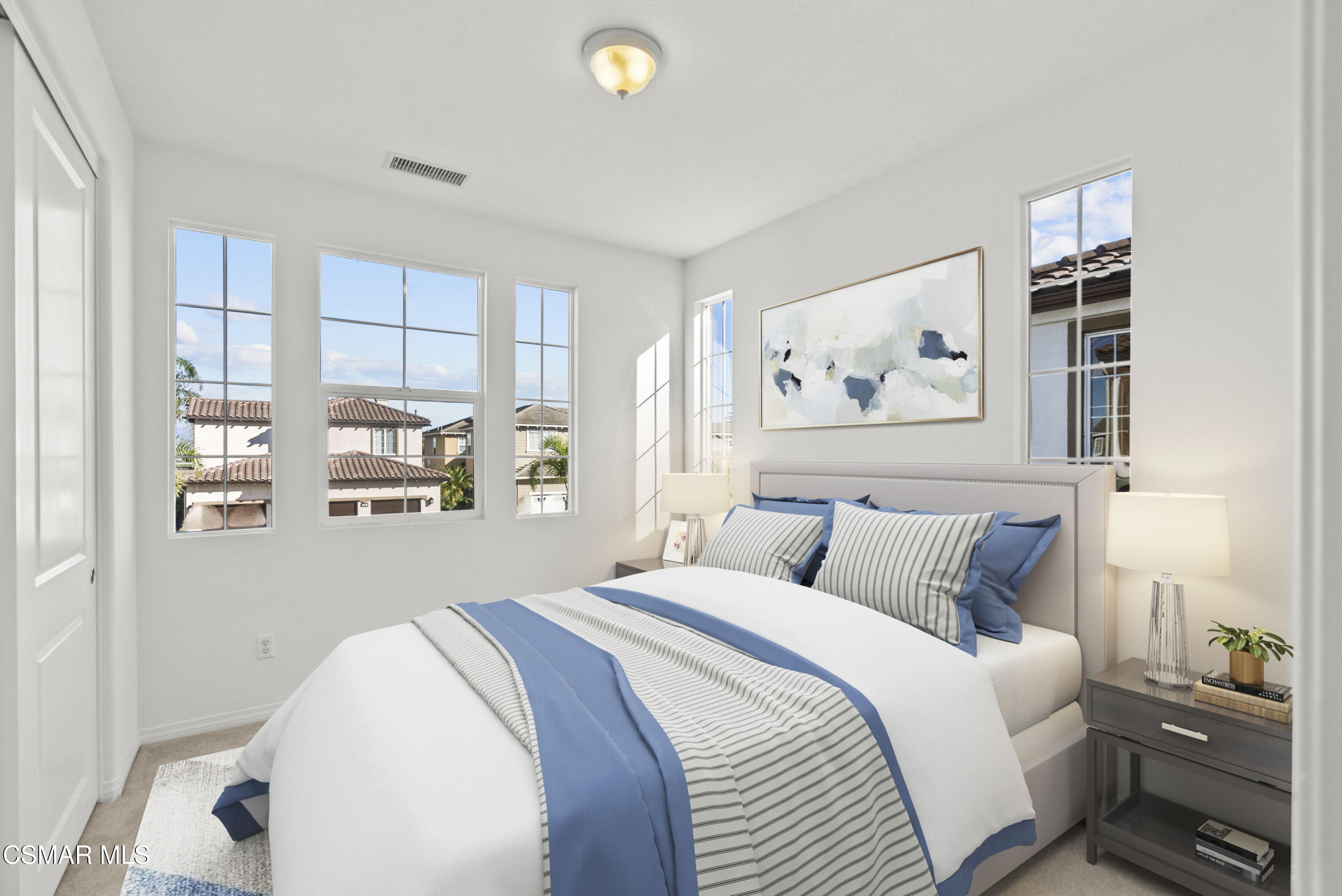 1316 Estuary Way Oxnard, CA 93035 - Photo 24 of 46 a bedroom with a large bed and a window