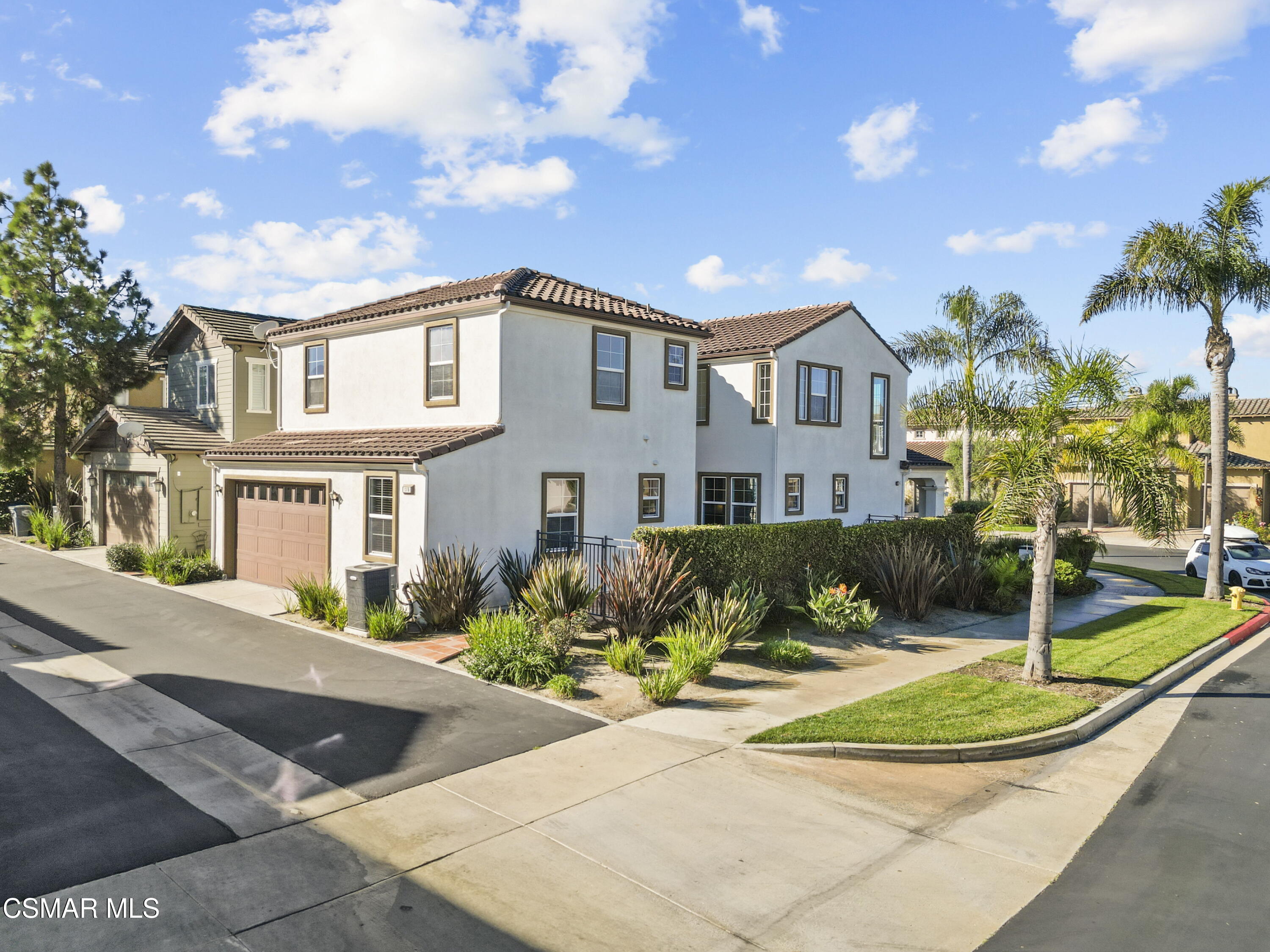 1316 Estuary Way Oxnard, CA 93035 - Photo 35 of 46 a front view of a house with a yard