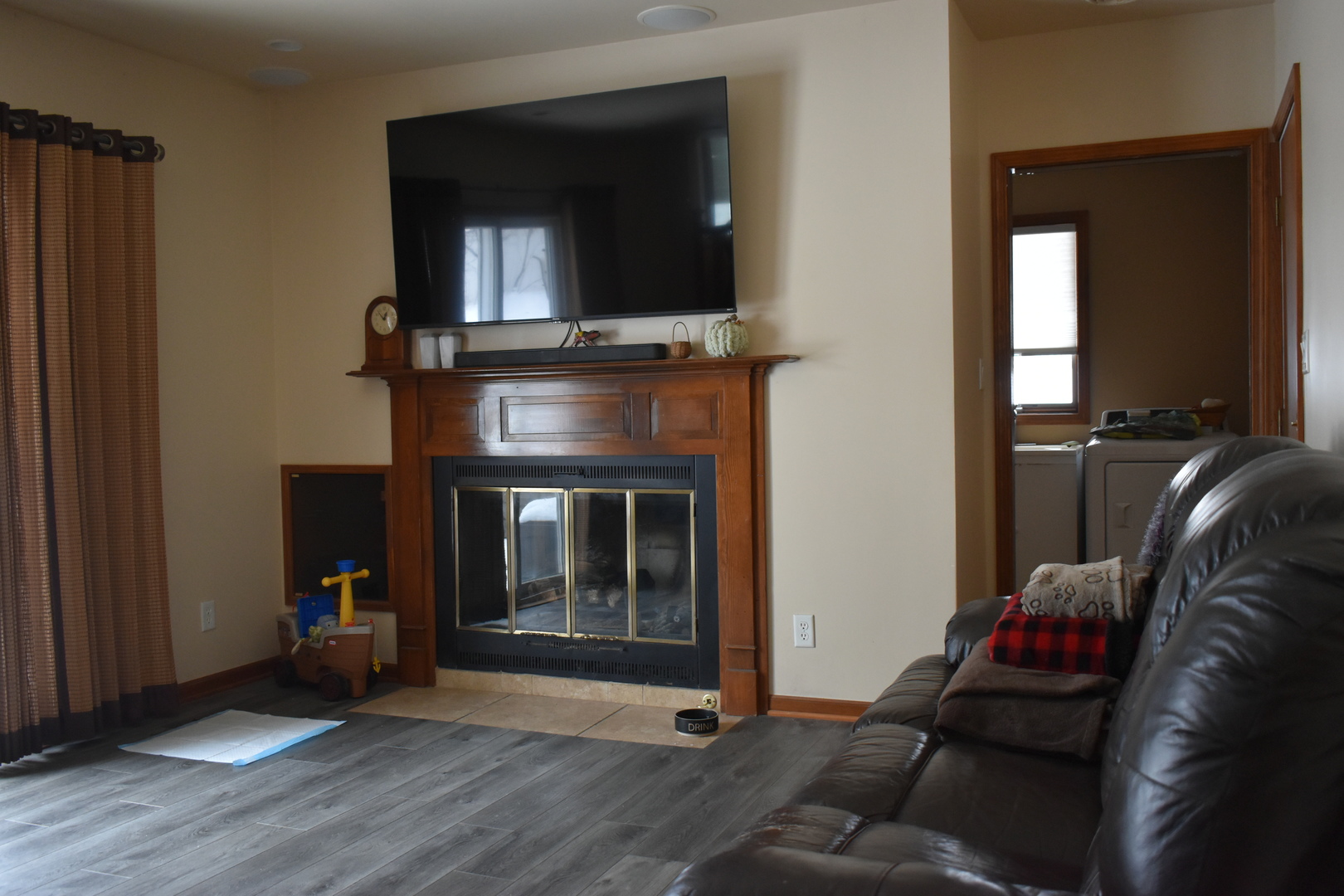 67 Castle Coombe Court Bourbonnais, IL 60914 - Photo 12 of 19 a living room with furniture and a fireplace
