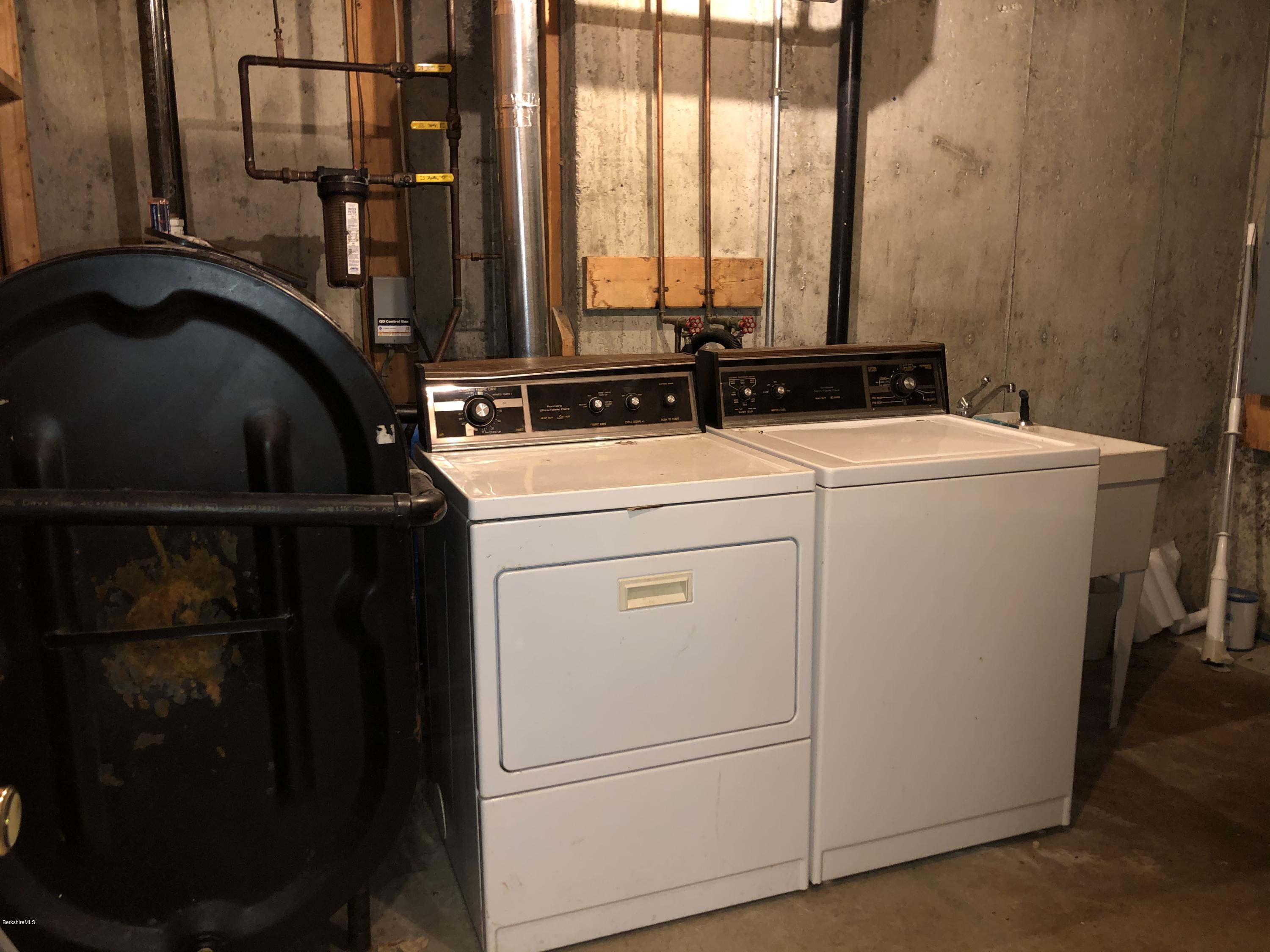 167 Bonny Rigg Hill Road Becket, MA 01223 - Photo 40 of 44 a utility room with dryer and washer