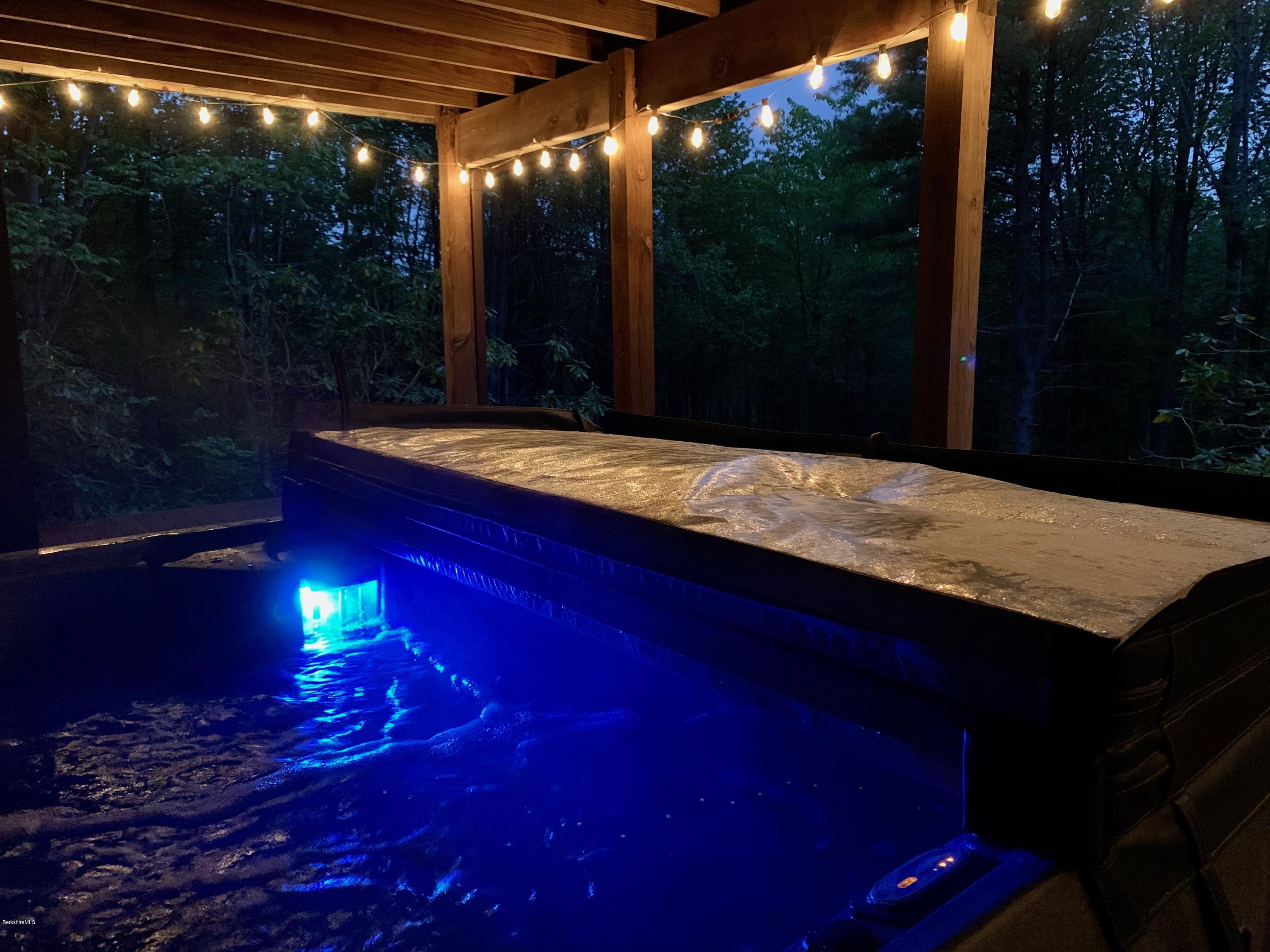 167 Bonny Rigg Hill Road Becket, MA 01223 - Photo 8 of 44 a view of swimming pool outdoor seating