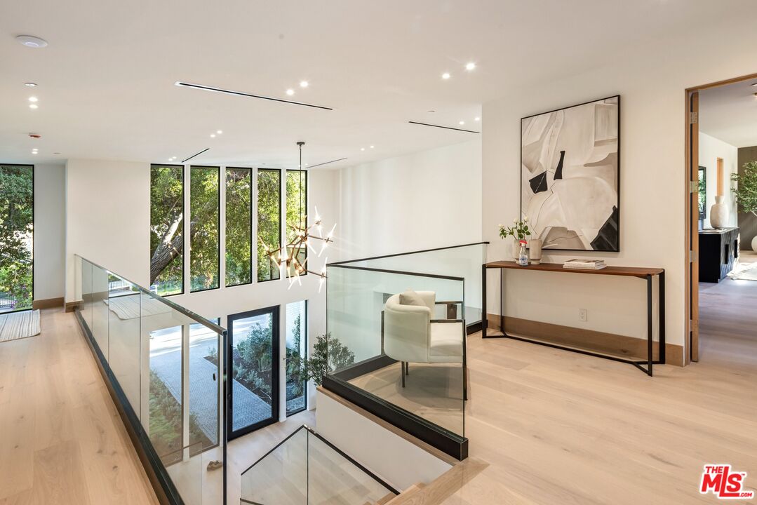 17055 Rancho Street Encino, CA 91316 - Photo 53 of 73 a living room with furniture