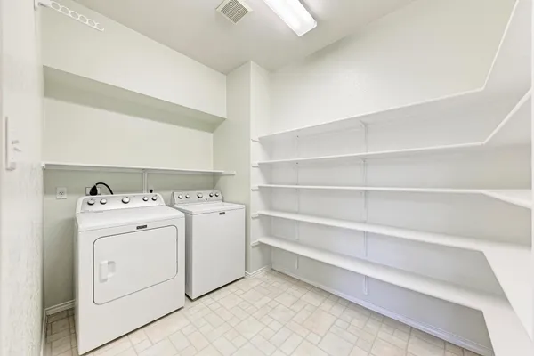 a view of a backyard with wooden floor