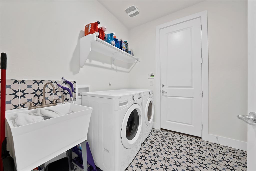 1010 Adair Road Prosper, TX 75078 - Photo 19 of 39 a utility room with dryer and washer