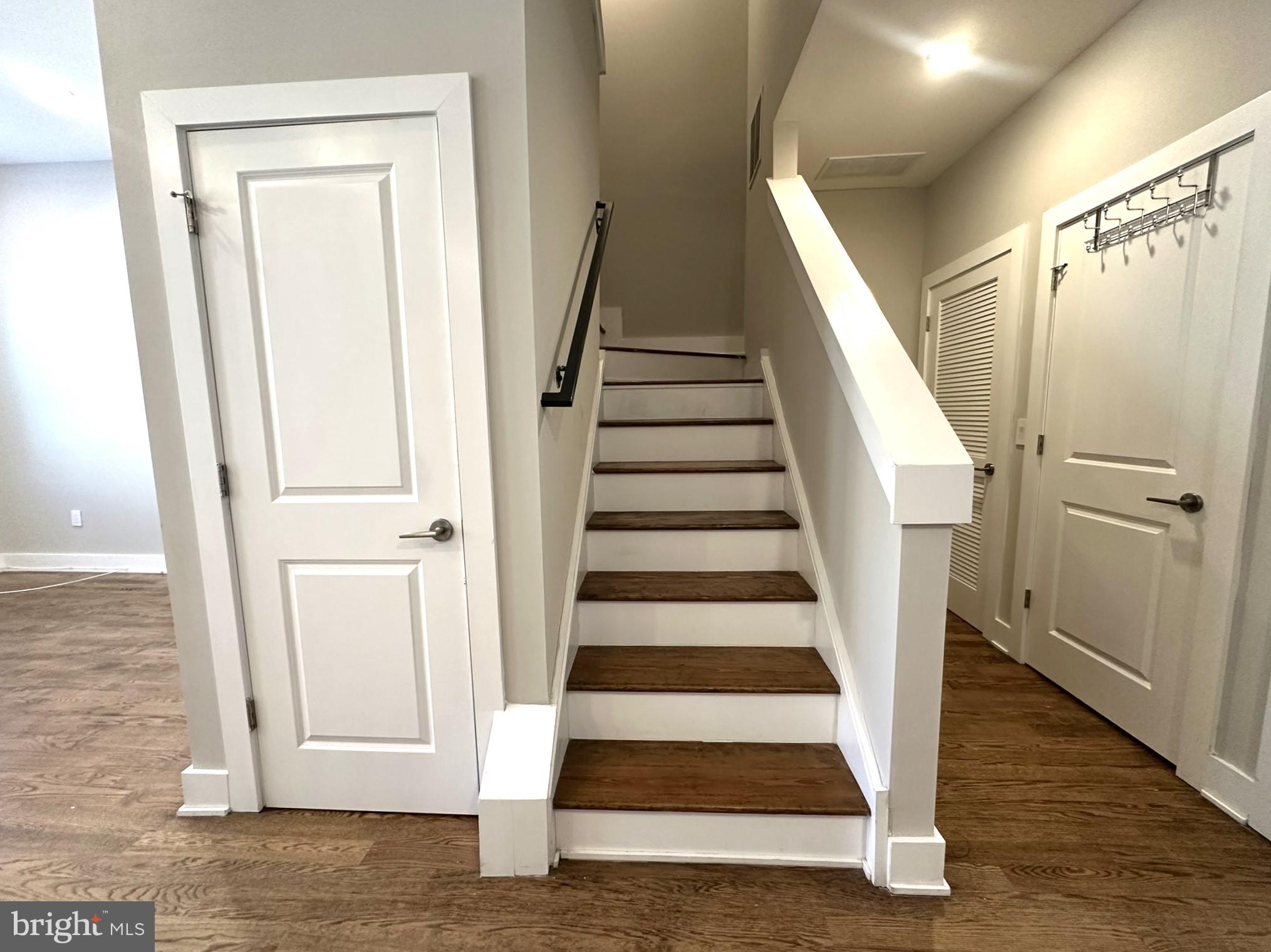 963 Shackamaxon Street, Unit 4 Philadelphia, PA 19125 - Photo 17 of 35 a view of entryway with wooden floor and door