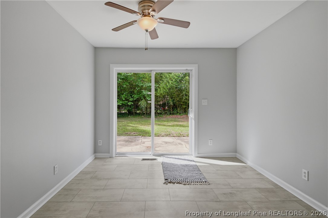 6228 Milford Road Fayetteville, NC 28303 - Photo 23 of 46 VIEW TO BACKYARD IN DINING SPACE