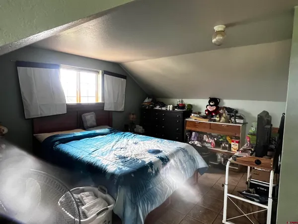 a kitchen with a table and chairs in it