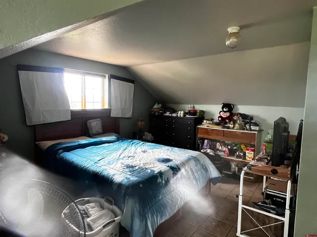 a kitchen with a table and chairs in it