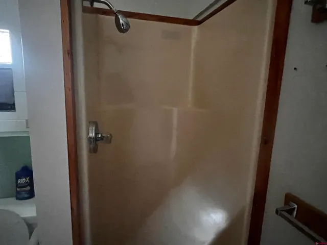 a view of a top of a house with a mountain in the background