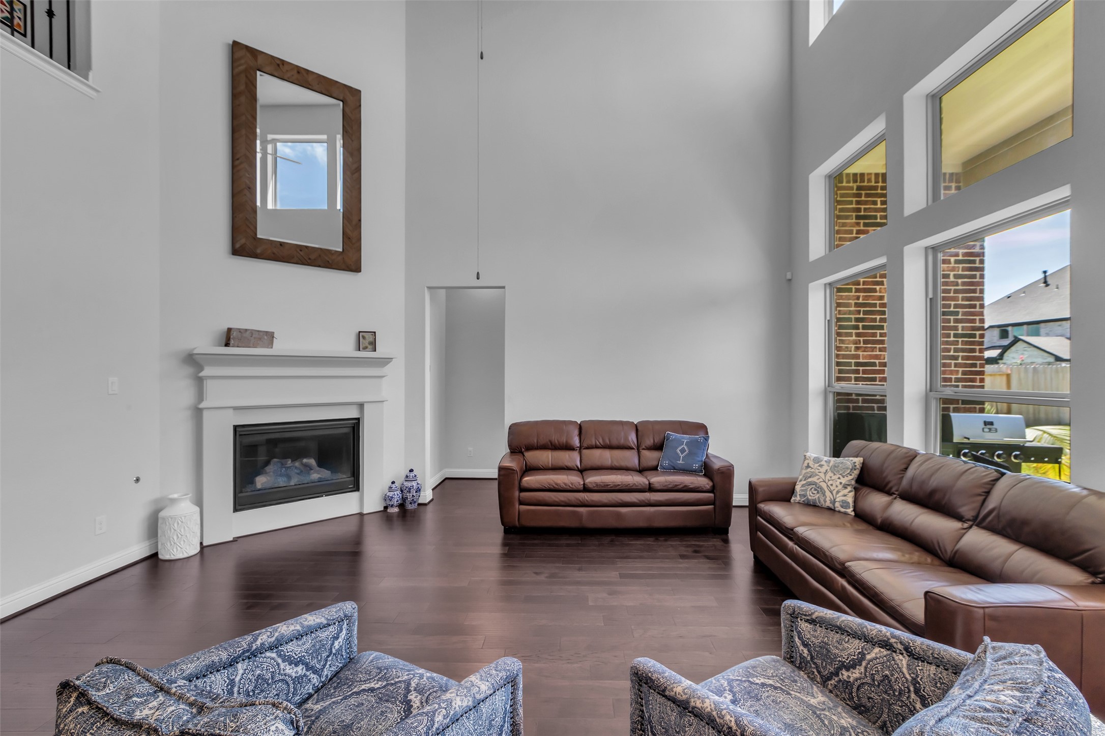423 Round Top Street Webster, TX 77598 - Photo 13 of 49 a living room with furniture window and a fireplace