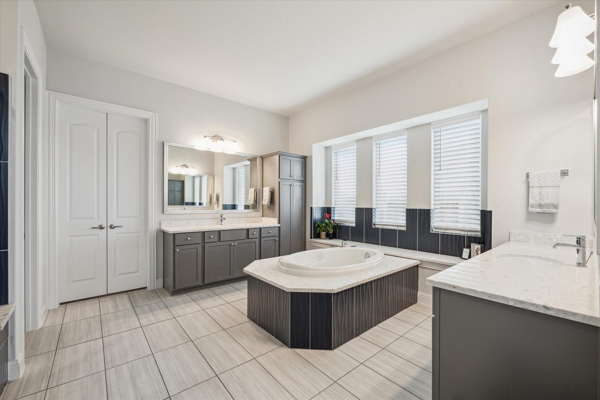 423 Round Top Street Webster, TX 77598 - Photo 23 of 49 a room with a table and chairs