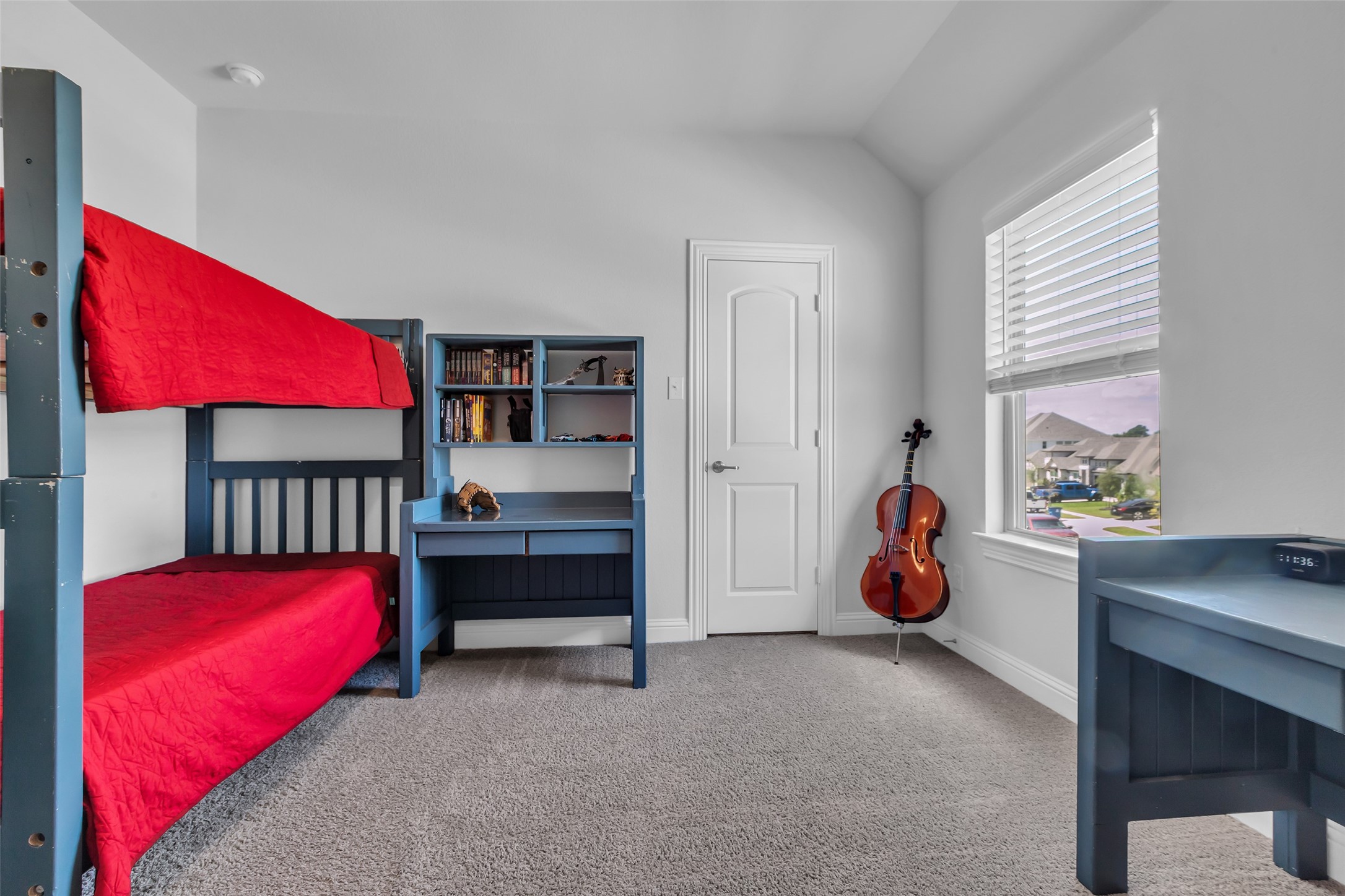 423 Round Top Street Webster, TX 77598 - Photo 31 of 49 a bedroom with furniture and a window