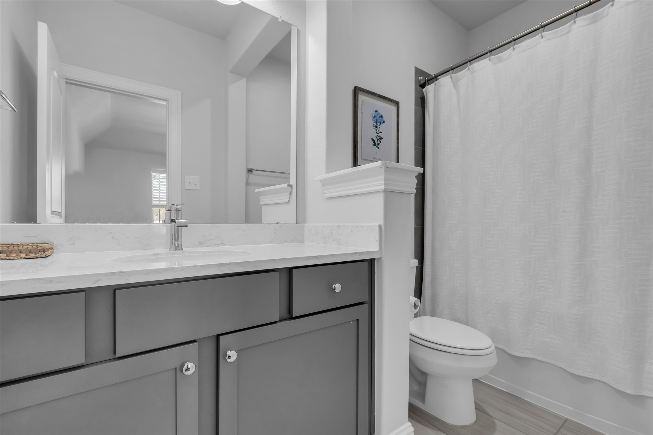 423 Round Top Street Webster, TX 77598 - Photo 35 of 49 a bathroom with a sink toilet and shower