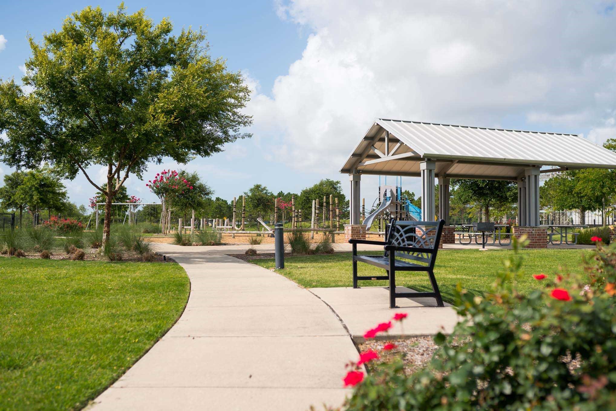 423 Round Top Street Webster, TX 77598 - Photo 47 of 49 a front view of a house with garden and sitting area