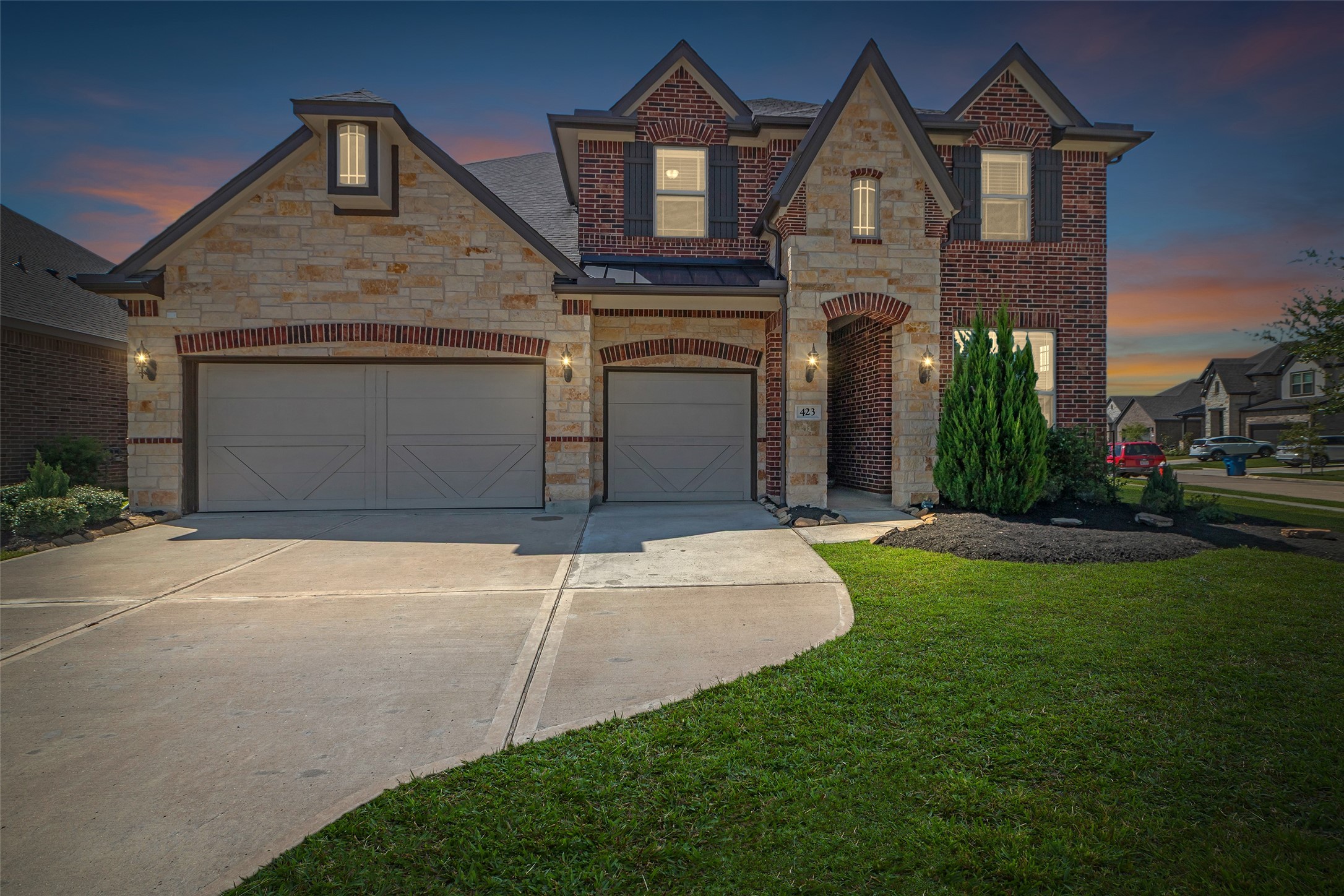 423 Round Top Street Webster, TX 77598 - Photo 49 of 49 a front view of a house with garden