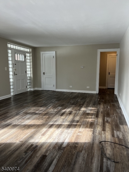 76 Ridge Road, Unit 2 Oak Ridge, NJ 07438 - Photo 6 of 12 a view of an empty room with window