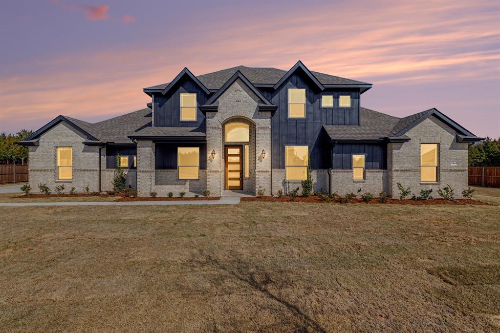 7041 Champion Road Midlothian, TX 76065 - Photo 1 of 30 front view of a house with a yard
