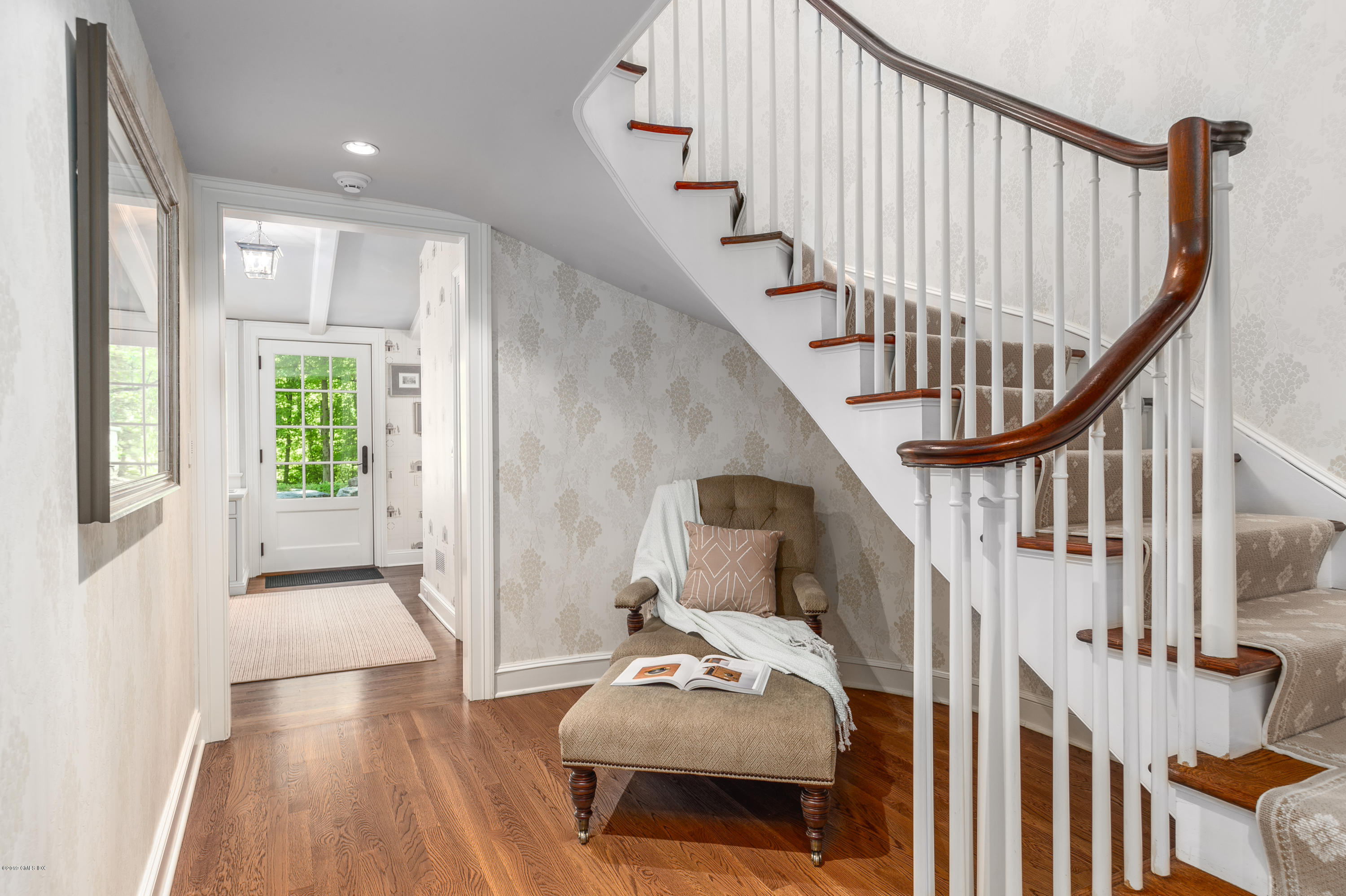 68 Doubling Road Greenwich, CT 06830 - Photo 14 of 40 a living room with furniture and stairs