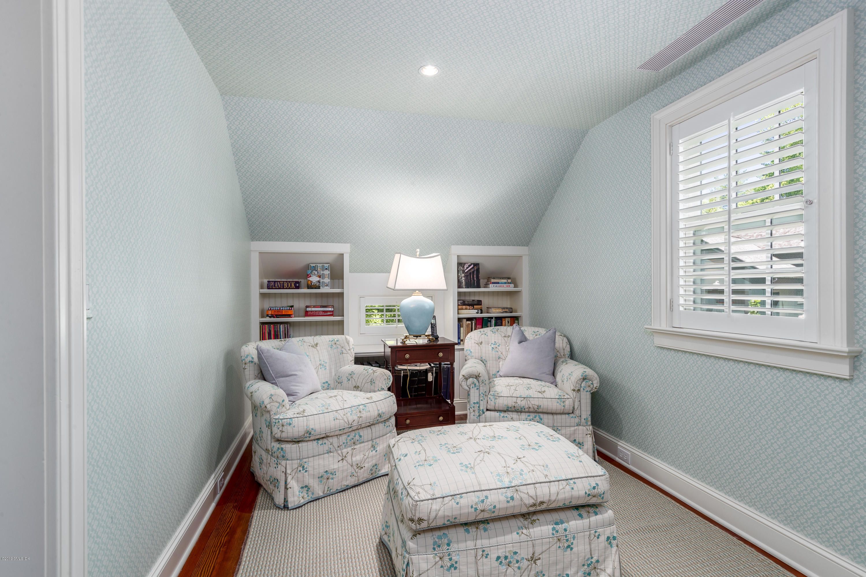 68 Doubling Road Greenwich, CT 06830 - Photo 18 of 40 a living room with furniture and a window