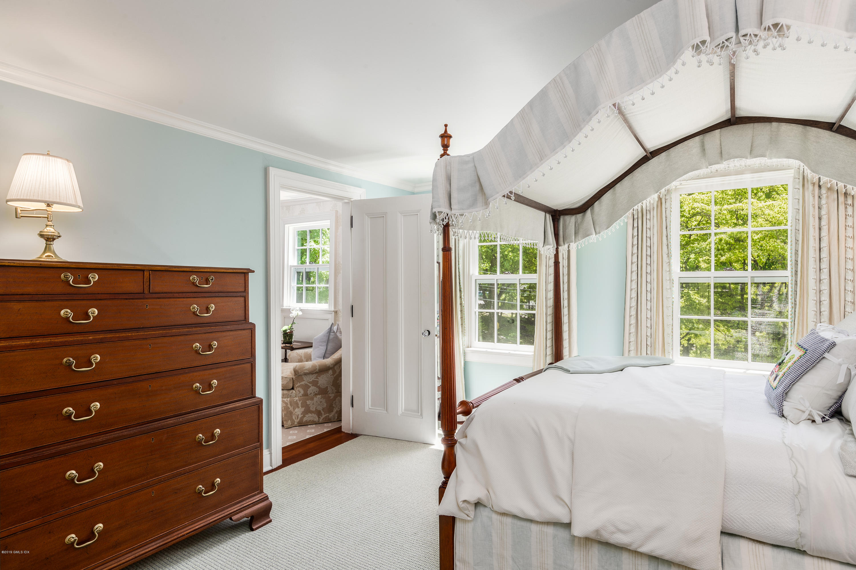 68 Doubling Road Greenwich, CT 06830 - Photo 19 of 40 a bedroom with a bed and a window