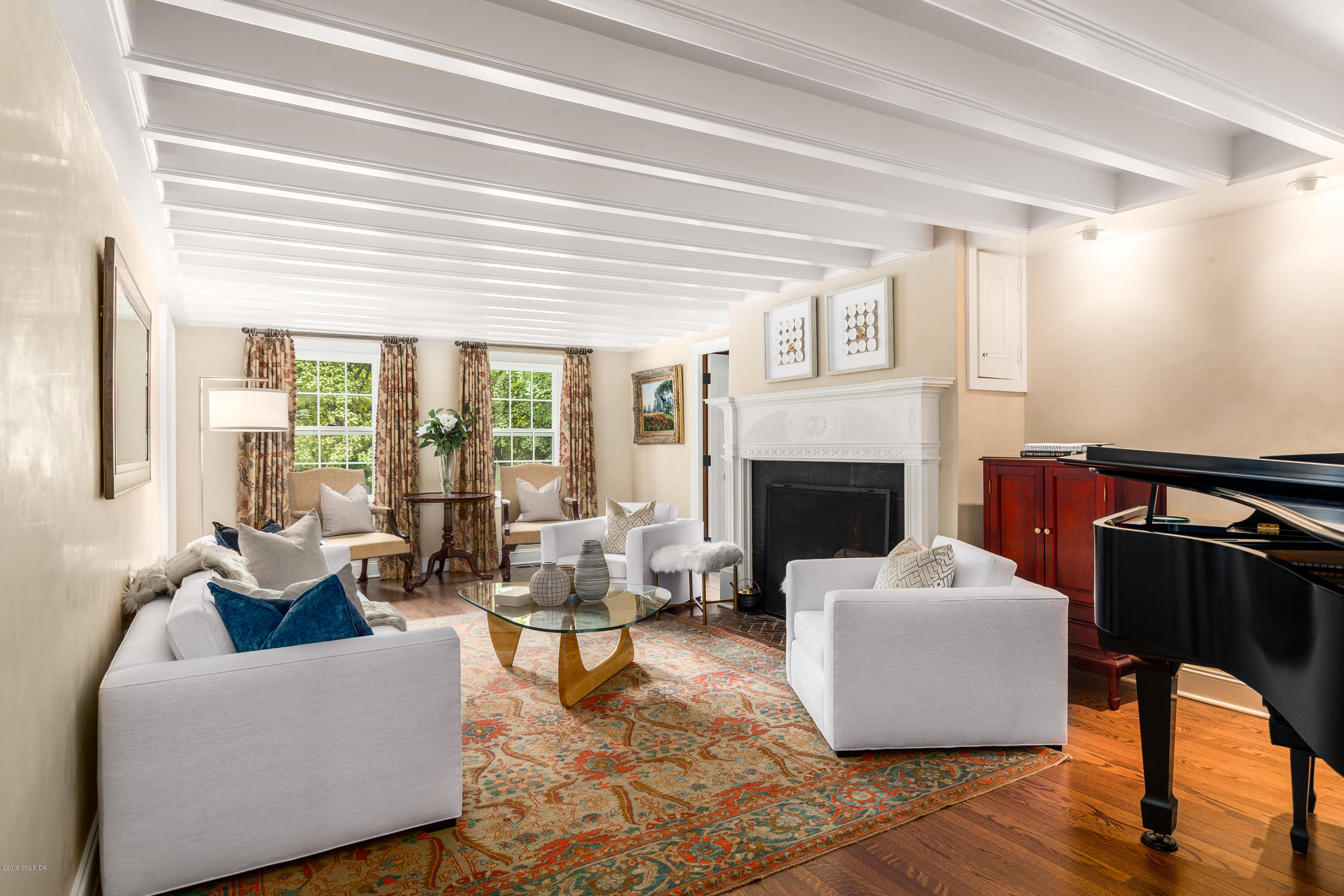 68 Doubling Road Greenwich, CT 06830 - Photo 2 of 40 a living room with furniture and a fireplace