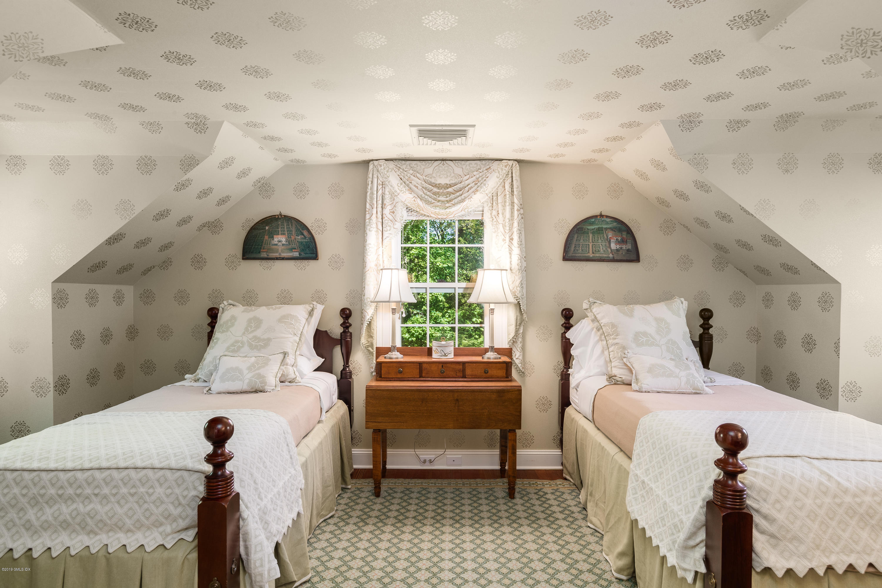 68 Doubling Road Greenwich, CT 06830 - Photo 22 of 40 a bed room with a bed and a chair