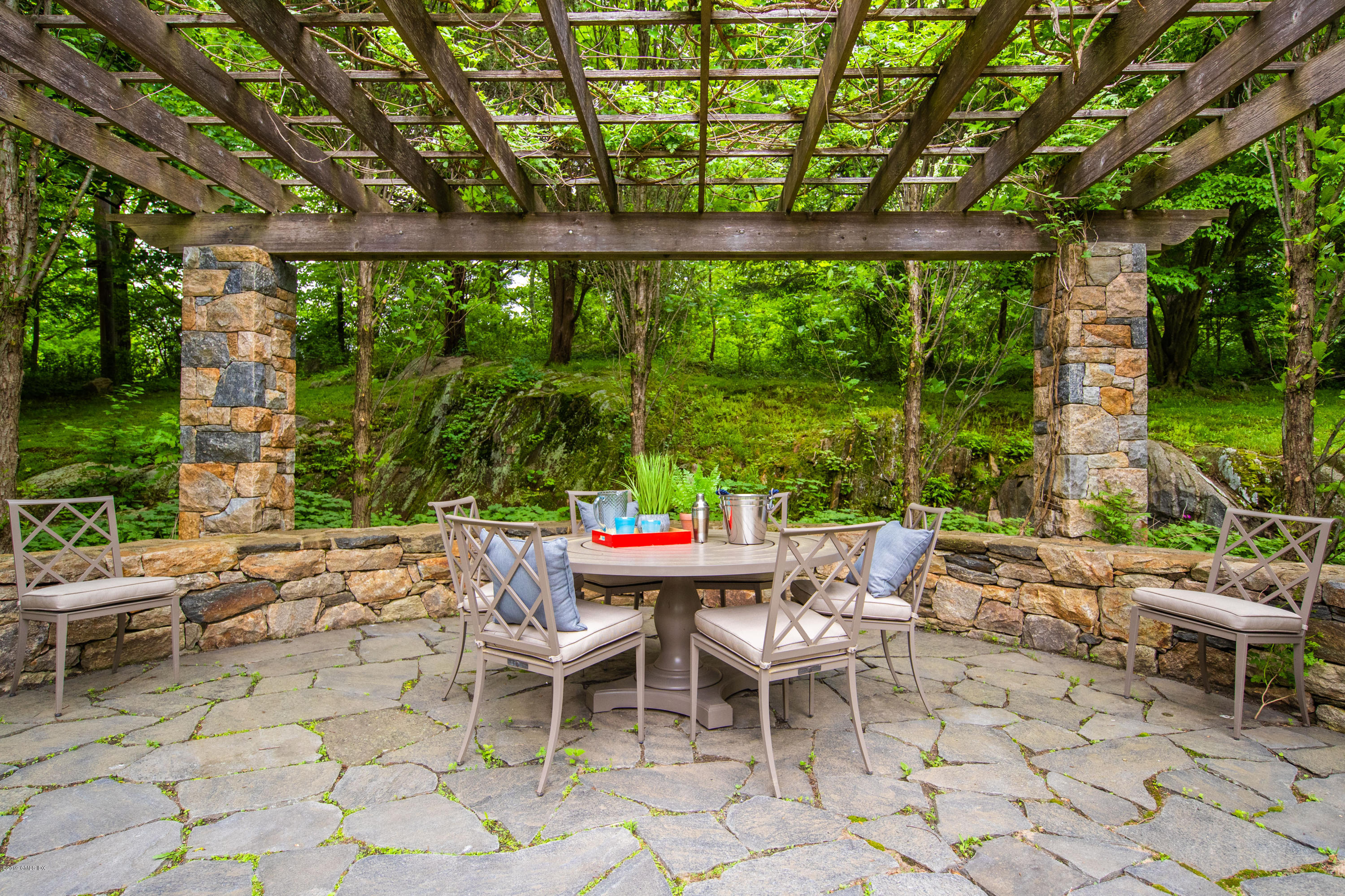 68 Doubling Road Greenwich, CT 06830 - Photo 33 of 40 a outdoor space with lots of tables and chairs