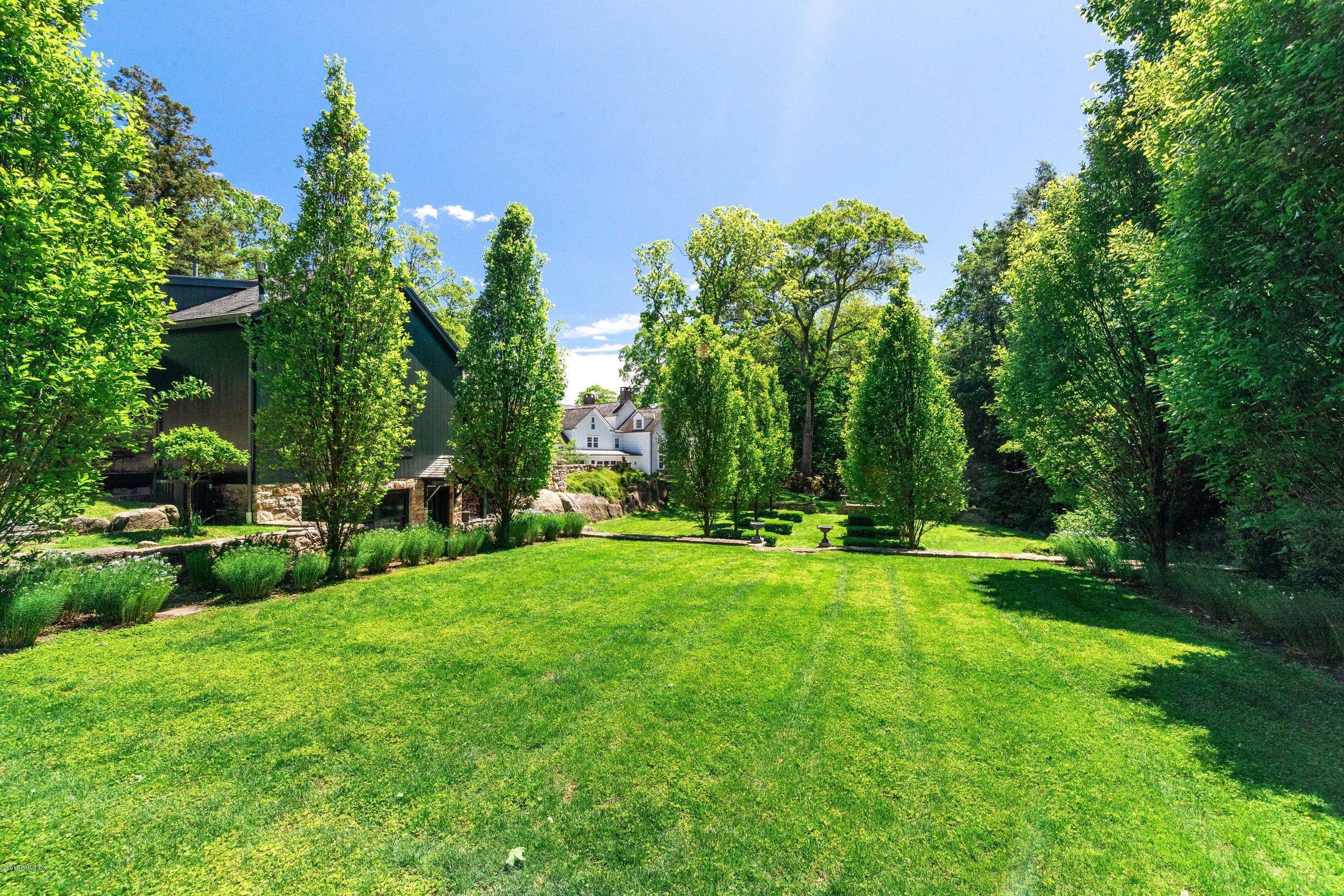 68 Doubling Road Greenwich, CT 06830 - Photo 37 of 40 a view of a lush green space