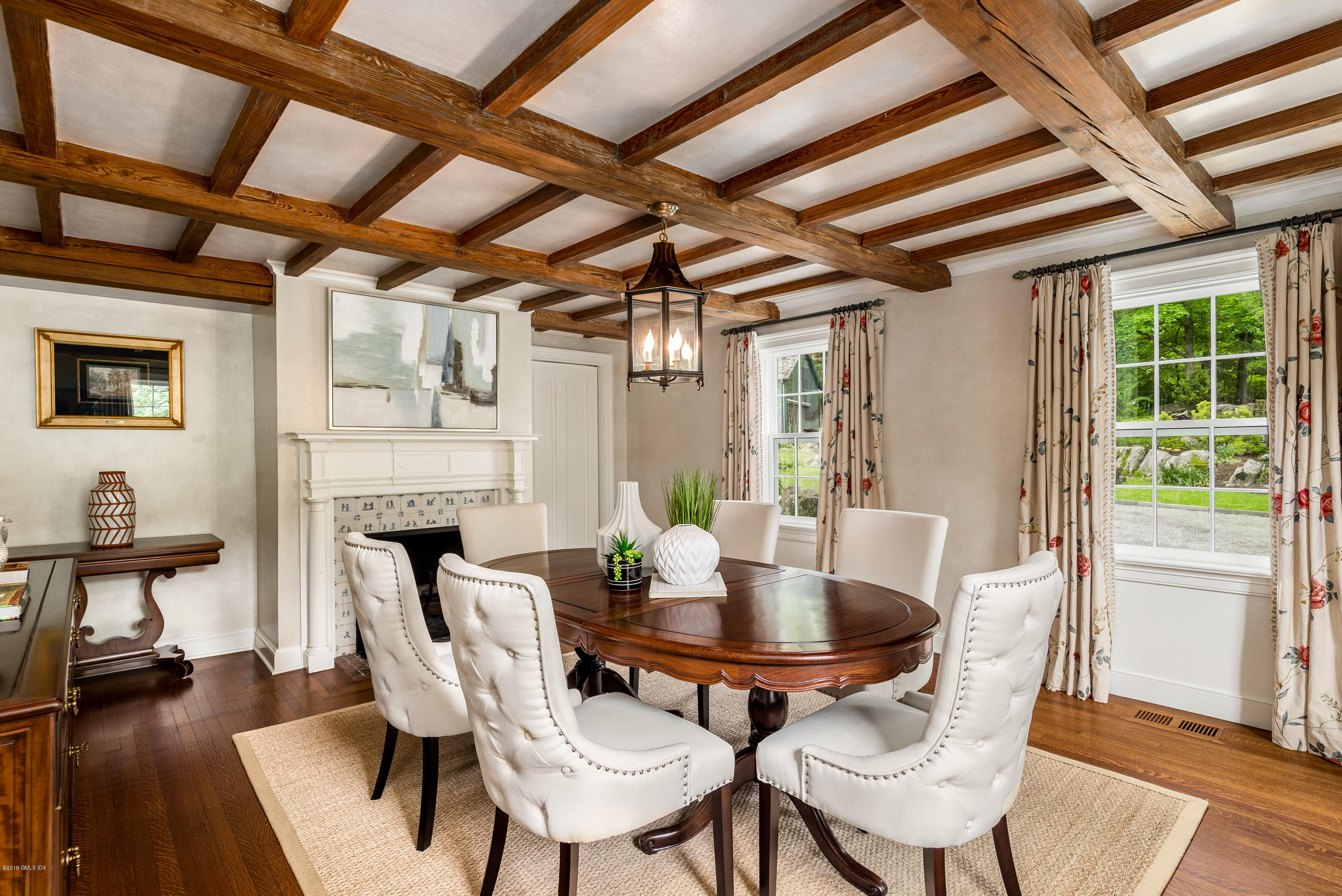 68 Doubling Road Greenwich, CT 06830 - Photo 4 of 40 a view of a dining room with furniture window and wooden floor