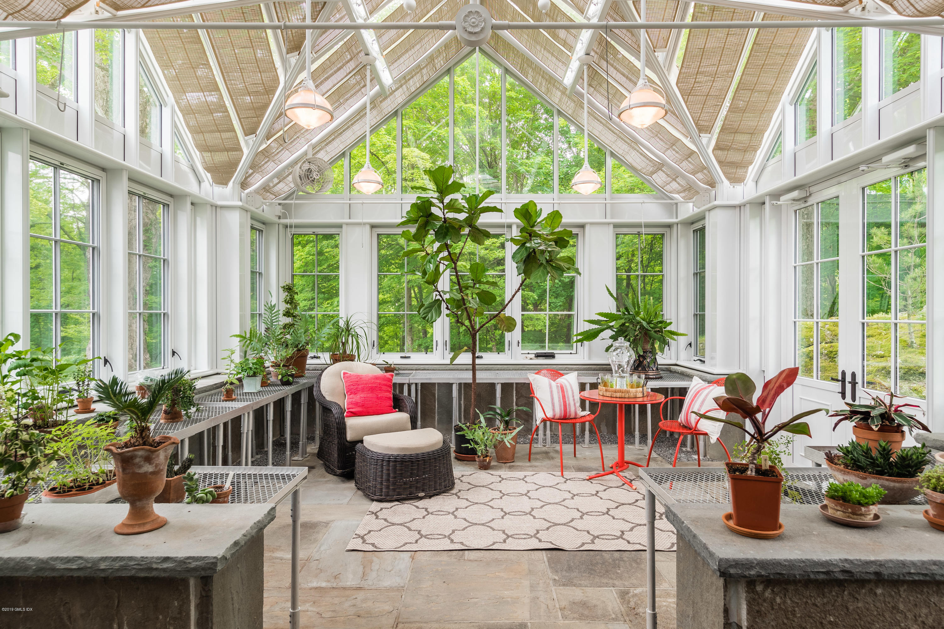 68 Doubling Road Greenwich, CT 06830 - Photo 5 of 40 a living room with patio furniture and garden view